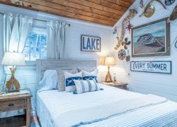  Queen Bedroom with mini refrigerator, microwave, TV, Keurig coffee maker, and chest of drawers for c