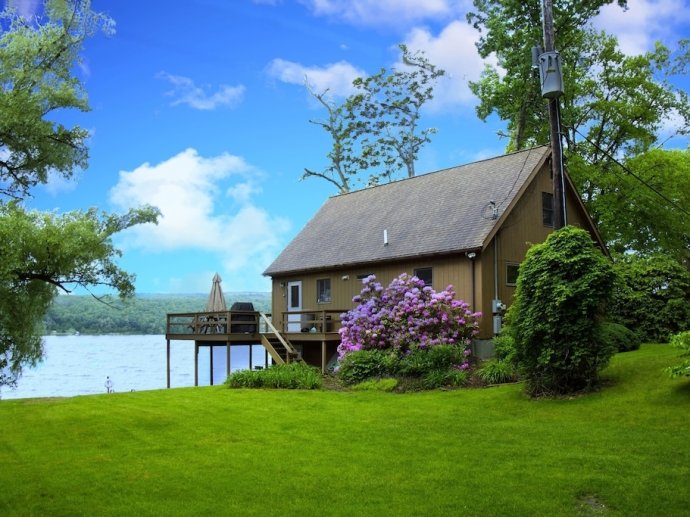 Keuka Lake! Vacationing at its best On 120 Feet Of Private Level Lakefront.